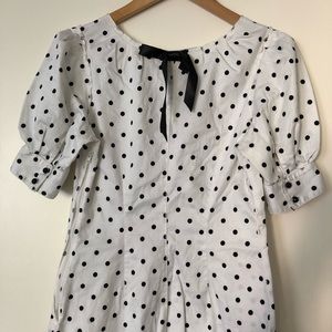 Dotted white top with puff shoulders